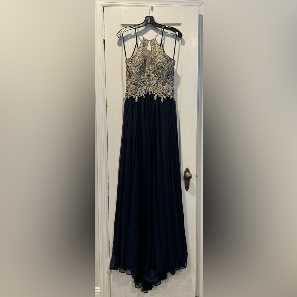 Navy and gold formal dress worn once for a sweet 16. Dry cleaned. Size 5/6